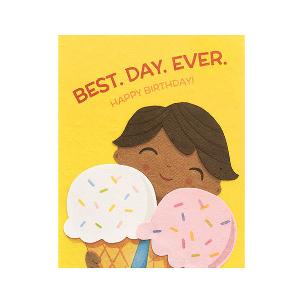 Fair Trade handmade yellow card depicting a smiling child holding 2 large ice cream cones (white and pink) with sprinkles. Message in red reads "best.day.ever. Happy birthday!"