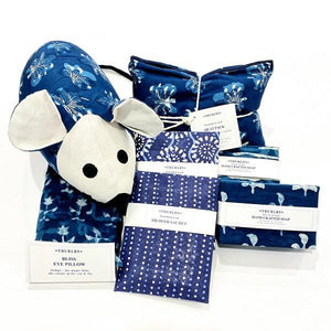 A collection of indigo home fragrance products.