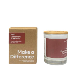 Candle with wooden lid and packaging labeled 'Cardamom & Tobacco' by kenshi on a white background.