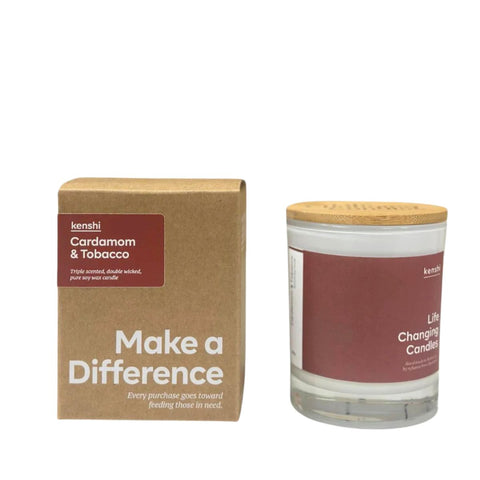 Candle with wooden lid and packaging labeled 'Cardamom & Tobacco' by kenshi on a white background.
