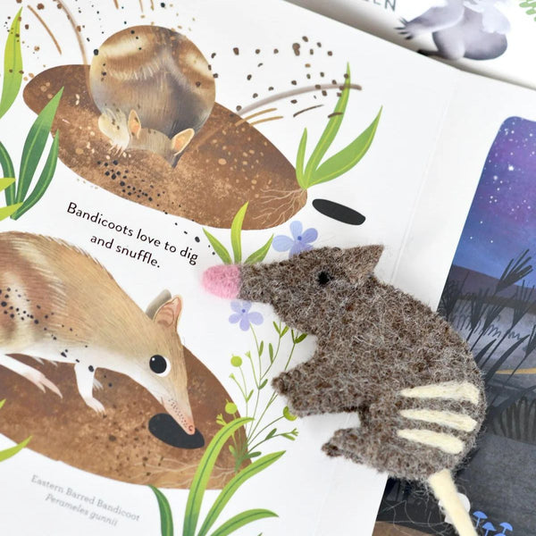 Illustrated book page with bandicoot illustrations and text, featuring a felt finger puppet bandicoot.