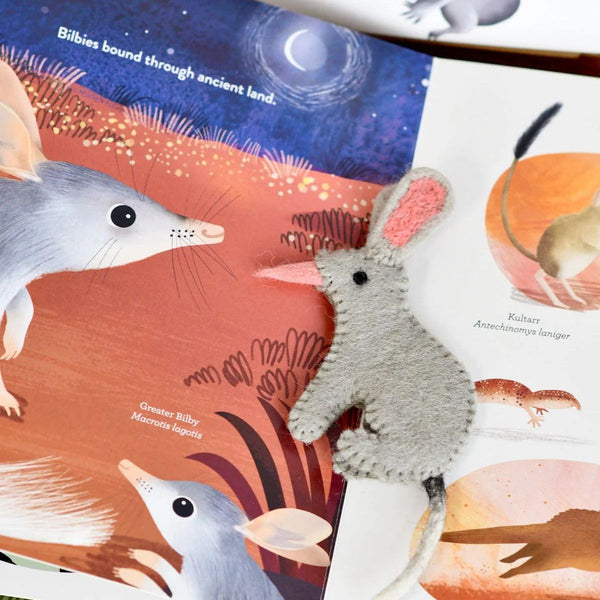 Illustrated book page with bilby illustrations and text, featuring a felt finger puppet bilby.