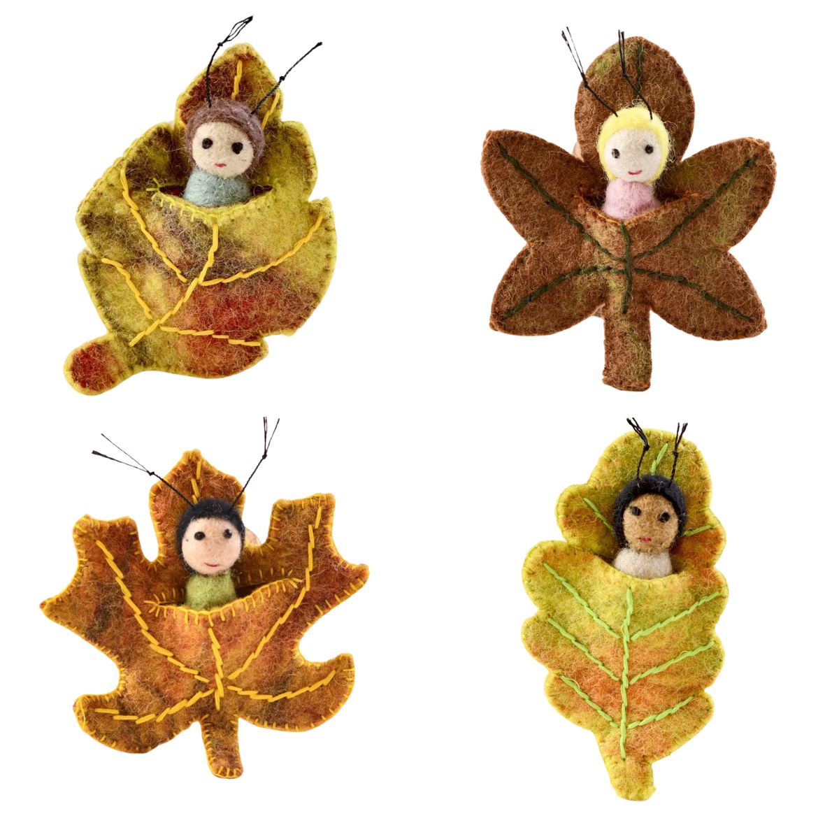 Eco-friendly felt leaf baby nestled in autumn leaf – fair trade toy