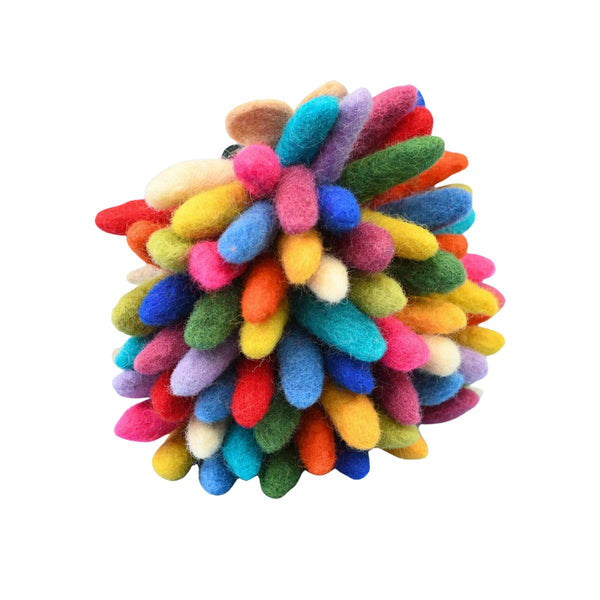Multicoloured back of felt hedgehog toy with fuzzy texture on a white background