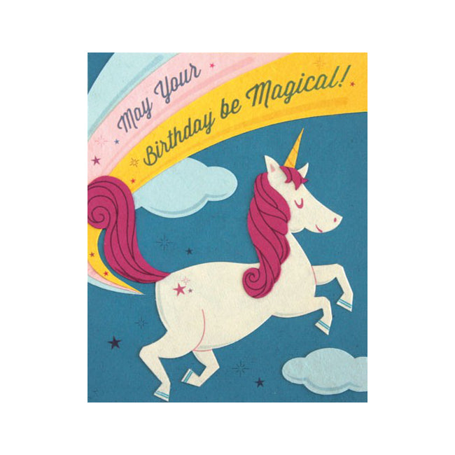 Fair Trade handmade card depicting a white and pink unicorn in front of a rainbow. Message reads "May your birthday be magical!"