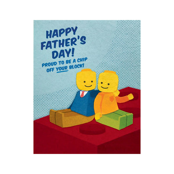 Fair Trade handmade card depicting 2 sitting Lego figurines sitting on red Lego block. Message reads "Happy Father's Day! Proud to be a chip off YOUR block!"